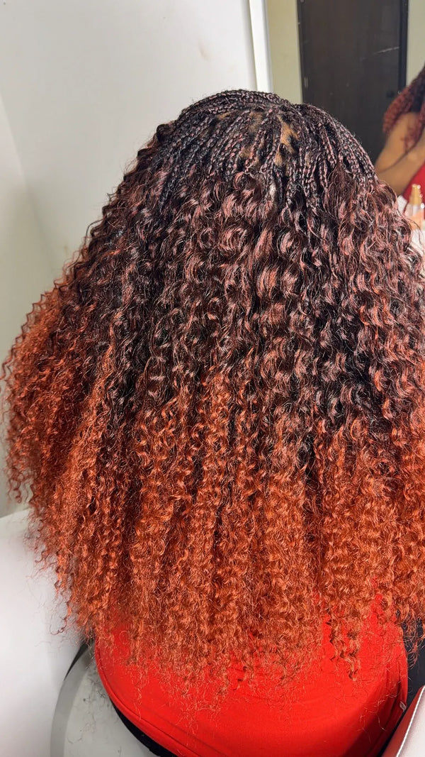 Back view of boho braids with copper ombre curls, braided at Lovely Hair in West Des Moines