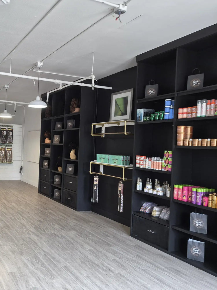 Inside the LovelyHair salon and beauty supply in Countryside Village, West Des Moines: braiding hair walls, wig shelves and hair care