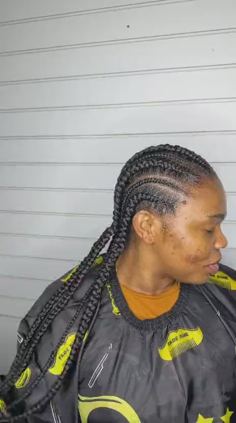 Video: feed-in cornrows seen from the side, braided back into long braids, braided at Lovely Hair in West Des Moines